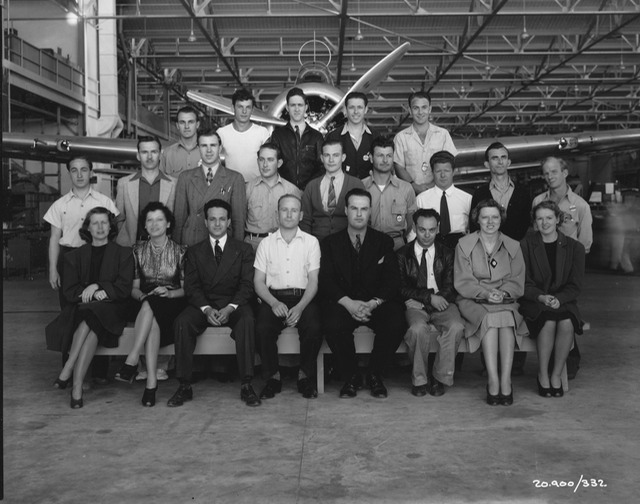 LOG STAFF  BUZZ HOLLAND ON LEFT